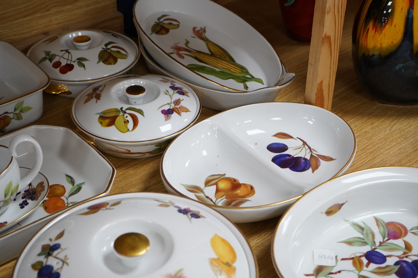 A collection of Royal Worcester Evesham dinnerware to include tureens, dishes and a sauce boat, largest 32cm wide. Condition - fair